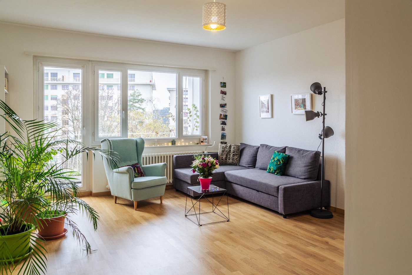 A bright, welcoming living room with natural wood and comfortable seating